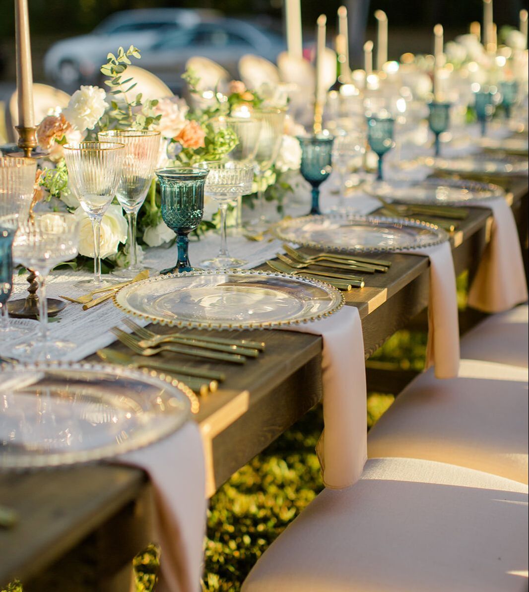 Intimate dinner with crystal charger plates, blush and blue tones