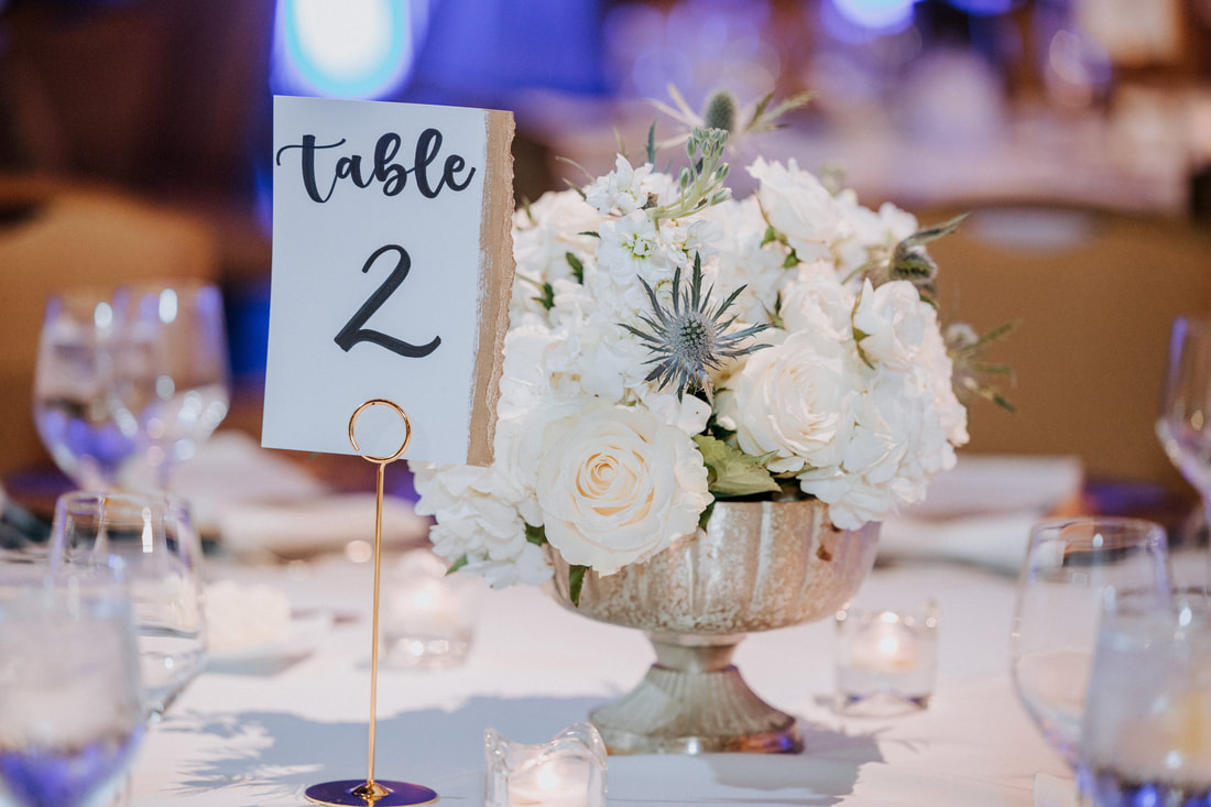 Low floral compote and table number