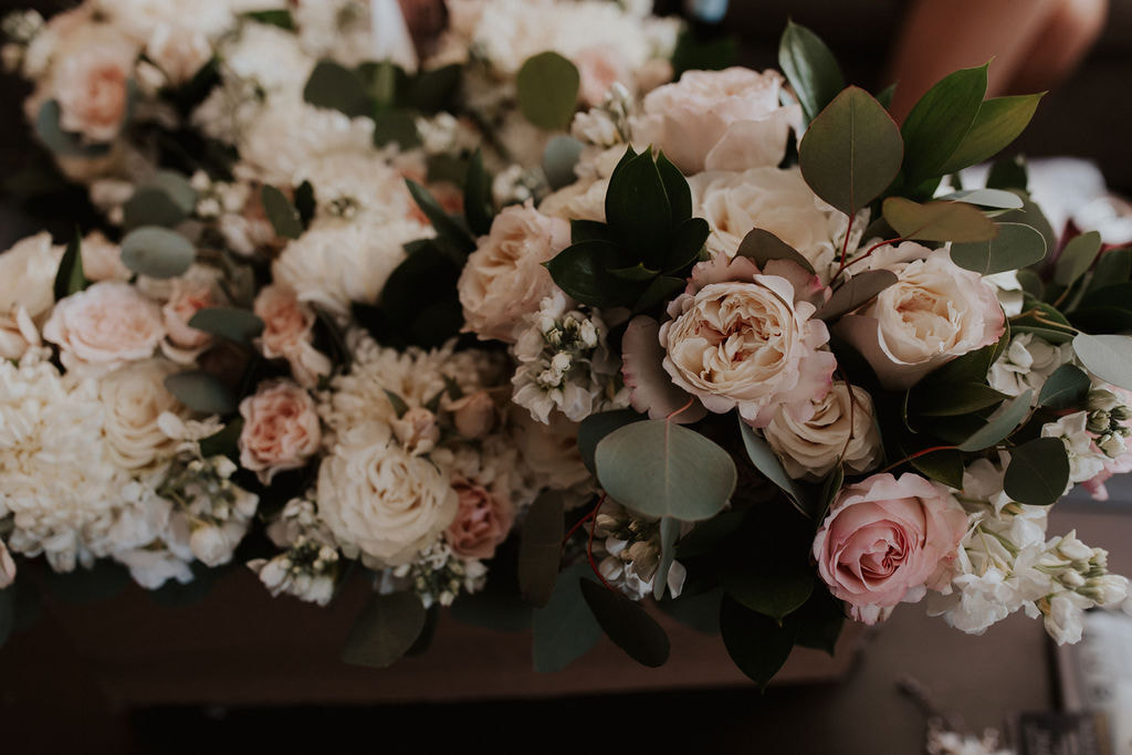 Blush and white flowers with eucalyptus 